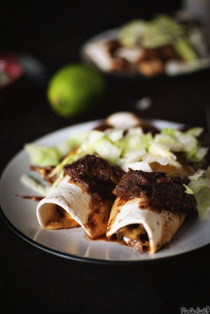 Beef Enchiladas topped with a sauce so perfect that you'll want to eat the whole tray.