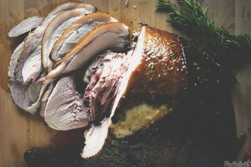 Above shot of a full ham leg smoked and sliced 