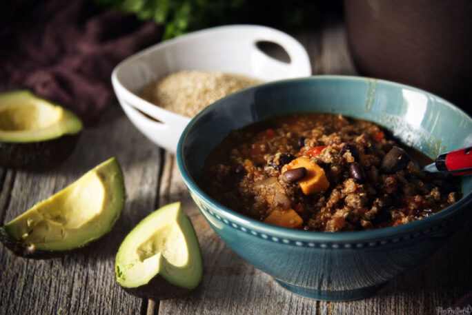 A warm bowl of chili loaded with goodness. And yes, I am going to throw some of that avocado in ;)