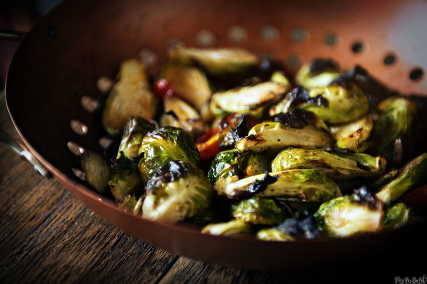 Charred Brussels sprouts showing off their grill marks. So good!