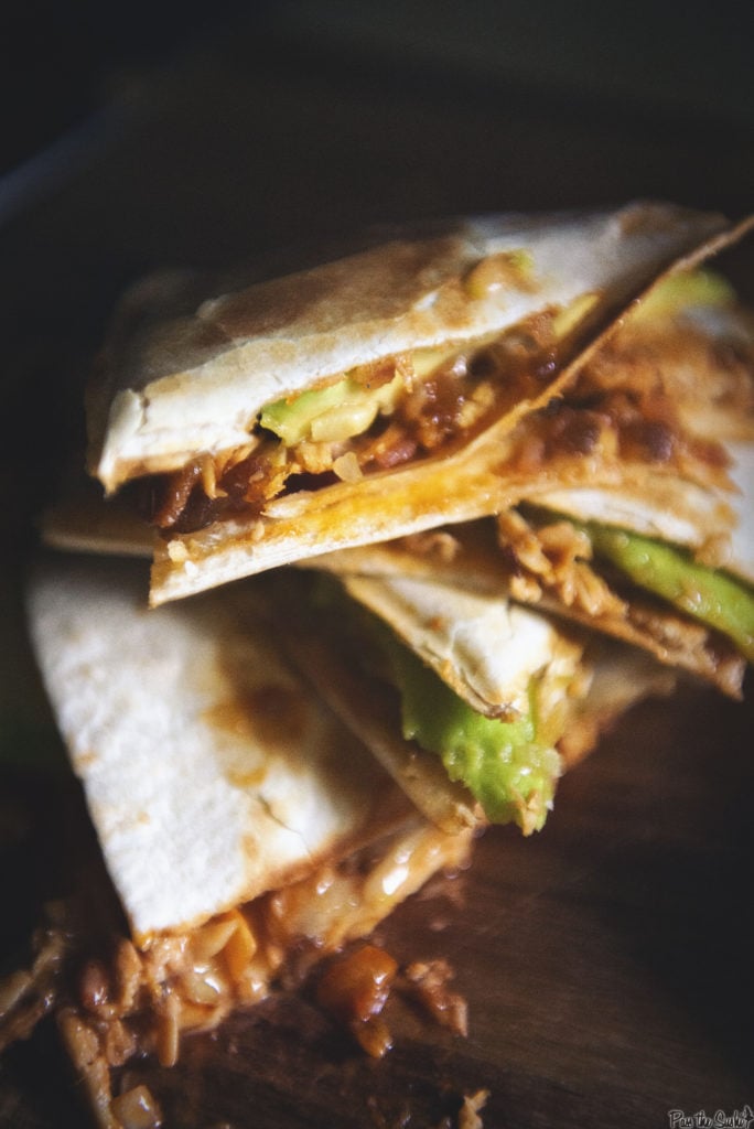 Perfectly grilled tortillas just oozing out layers of cheese, bacon, chicken and avocado. So Good!