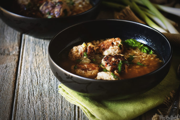 A savory bowl of Gingered Chicken Meatball Soup. Tons of Brown Rice and Basil make this just perfect.