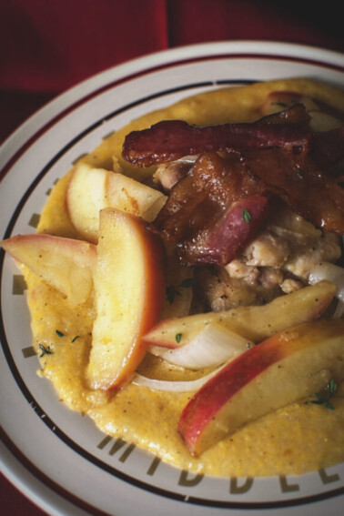 cropped-Chicken-Thighs-with-Apples-Onions-Over-Cheddar-Polenta-Kita-Roberts-GirlCarnivore.jpg