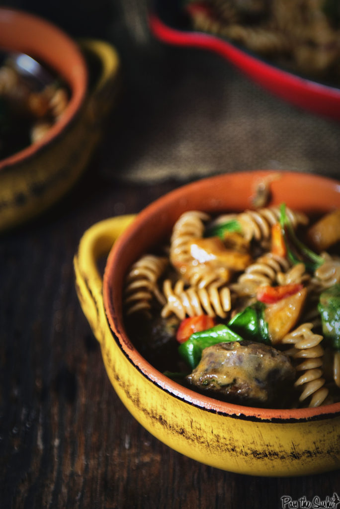 This close-up lets you see just how those big juicy chunks of sausage, sautéed peppers and rotini are just coated with the perfect amount of cheese. oh yeah, fat and happy.