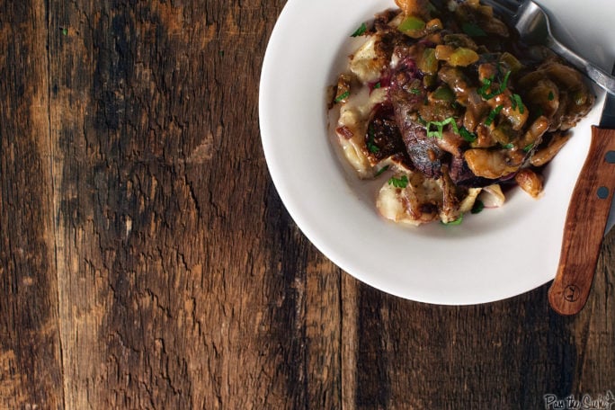 Shrimp Etouffee is piled on top of this tender Filet, all over a bed of potatoes. Dinner is served.