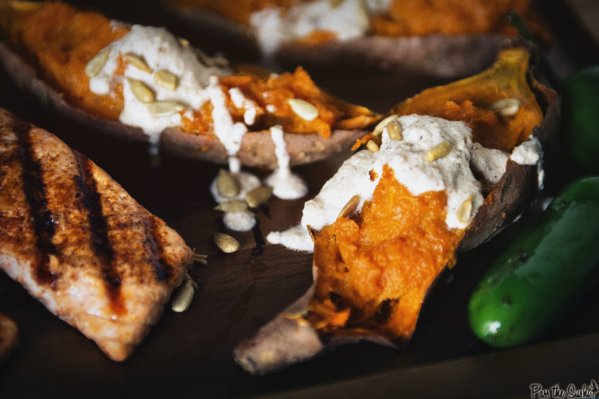 Salmon grilled with ancho rub topped with creamy nogada sauce.