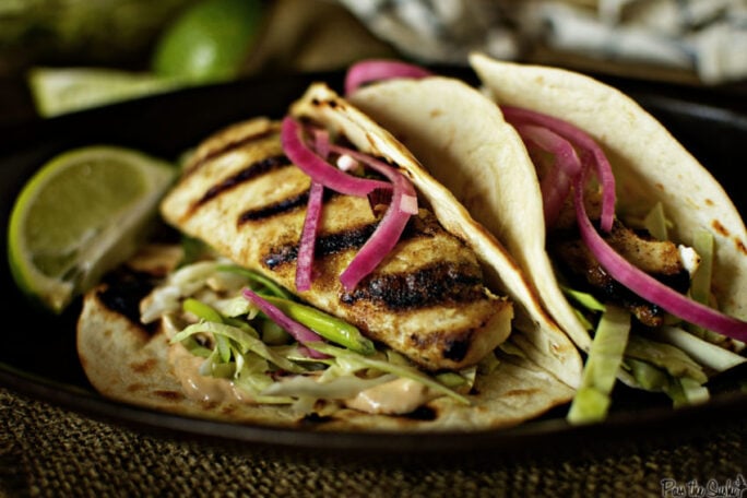 Fresh Mahi with cabbage and red onions on a taco shell. Yeah, that's good.