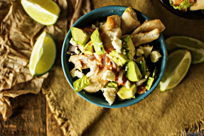 Just look at that pile of avocado on top of the chicken! some queso, rice and salsa round out this bowl, with plenty of limes on the side for squeezing.