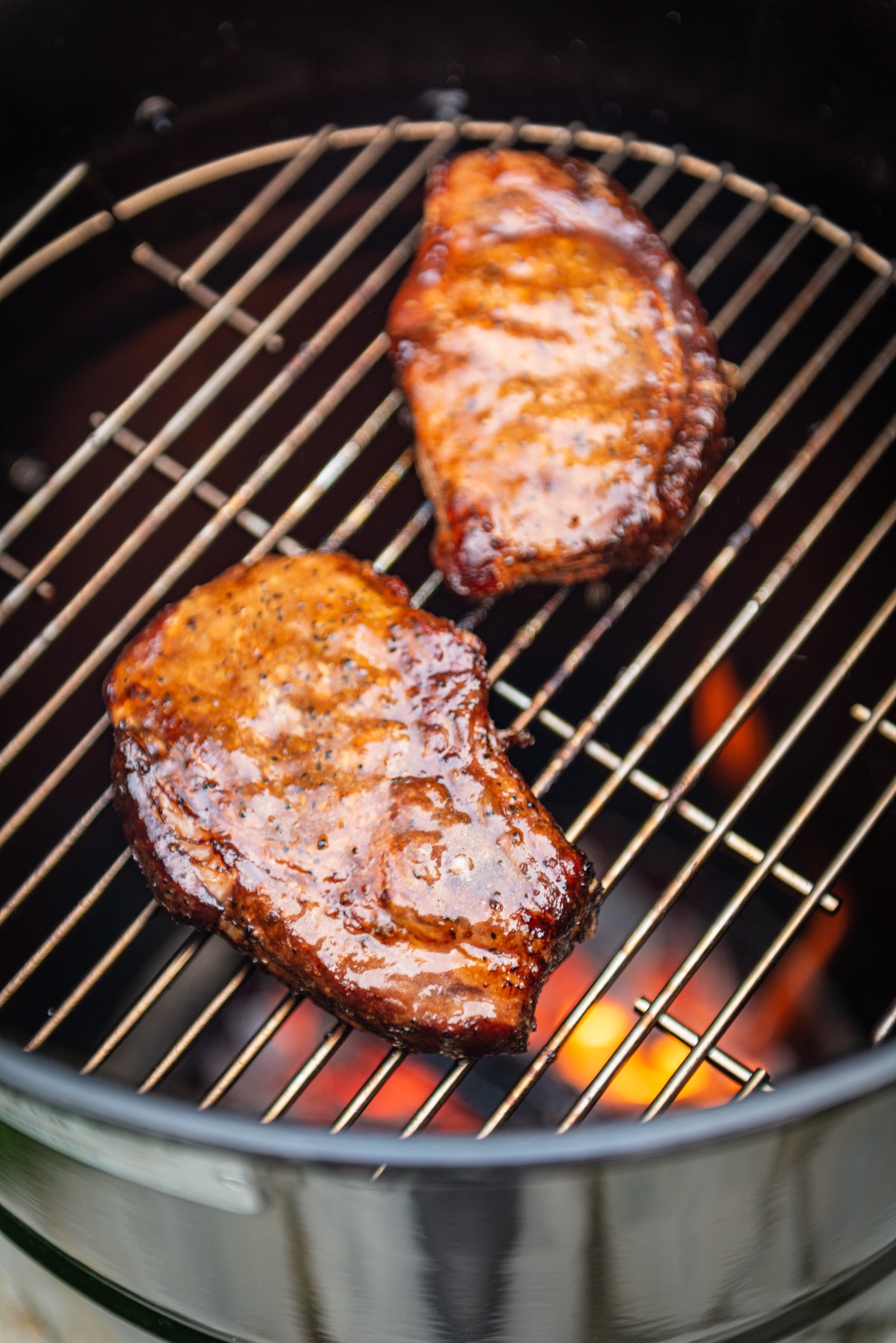 Smoked pork chops grilling.