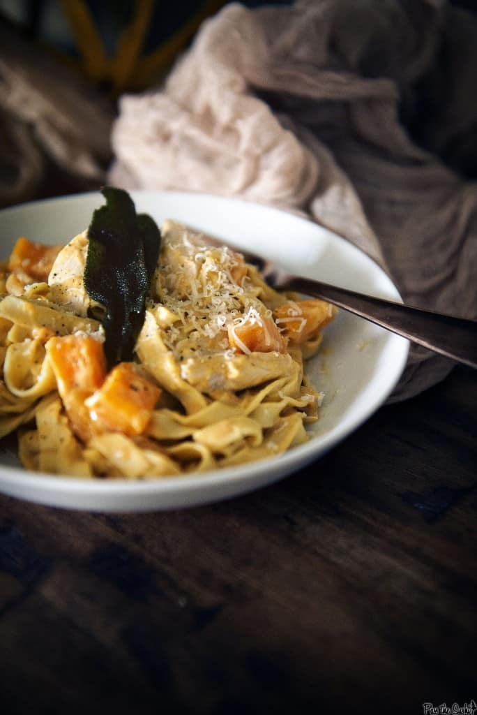 Freshly grated parmesan top this amazing feast. Big chunks of squash and turkey are piled on top of fresh noodles. All tossed in a pumpkin alfredo sauce!