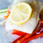 Halibut Baked in Parchment with Pistachio Mint Pesto Recipe | Kita Roberts GirlCarnivore.com