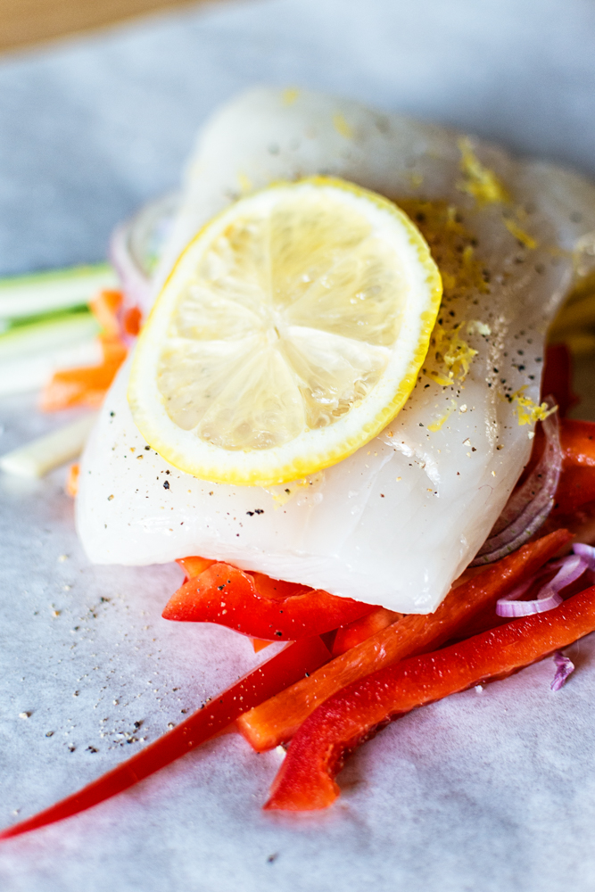 Halibut Baked in Parchment with Pistachio Mint Pesto Recipe | Kita Roberts GirlCarnivore.com