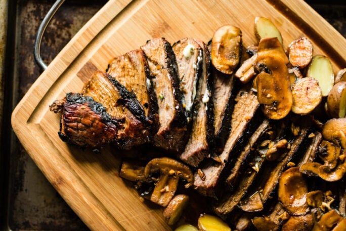 Grilled Tri-Tip Steak with Mushrooms and Herb Compound Butter | Kita Roberts GirlCarnivore.com