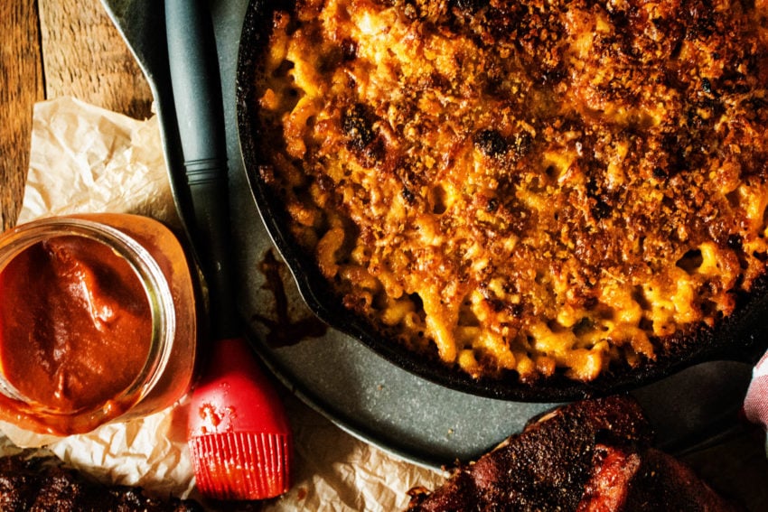 Overhead shot of skillet full of creamy mac and cheese. 