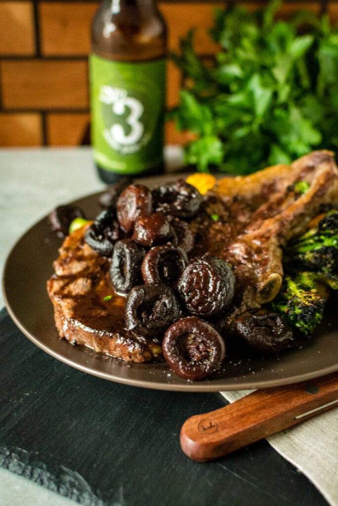 This steak is piled with mushrooms and laid over a bed of broccoli. This is good eating!
