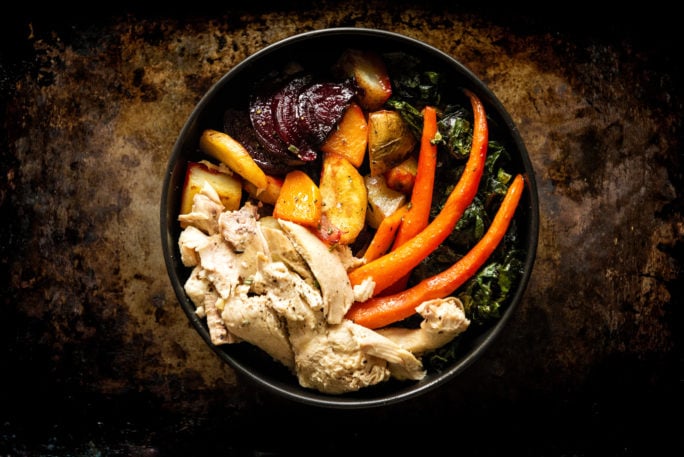 Roasted Roots veggies, chard and chicken make this more than a snack. This power bowl is legit fuel.