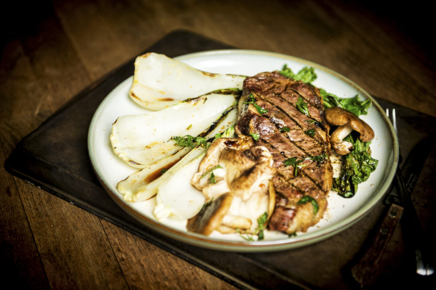This New York Strip Plated with grill kissed Bok Choy is a whole new level of steak night!