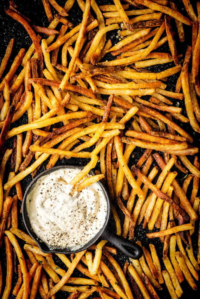 Duck fat fries with homemade aioli for dipping close up.