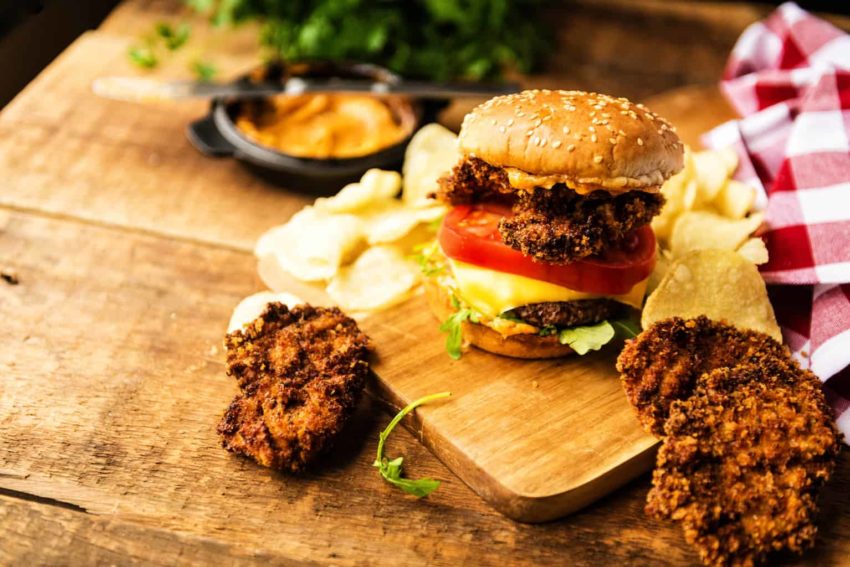 Piles of Fried Oyster top this over the top burger. And that monstrous slice of tomato is no joke.