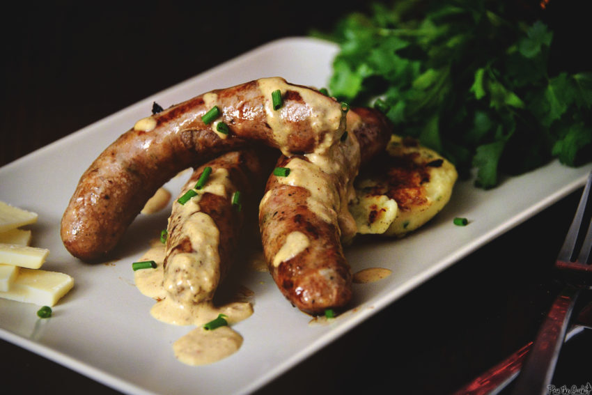 Irish Sausage over potato cakes drizzled with Stout Mustard Cream sauce.