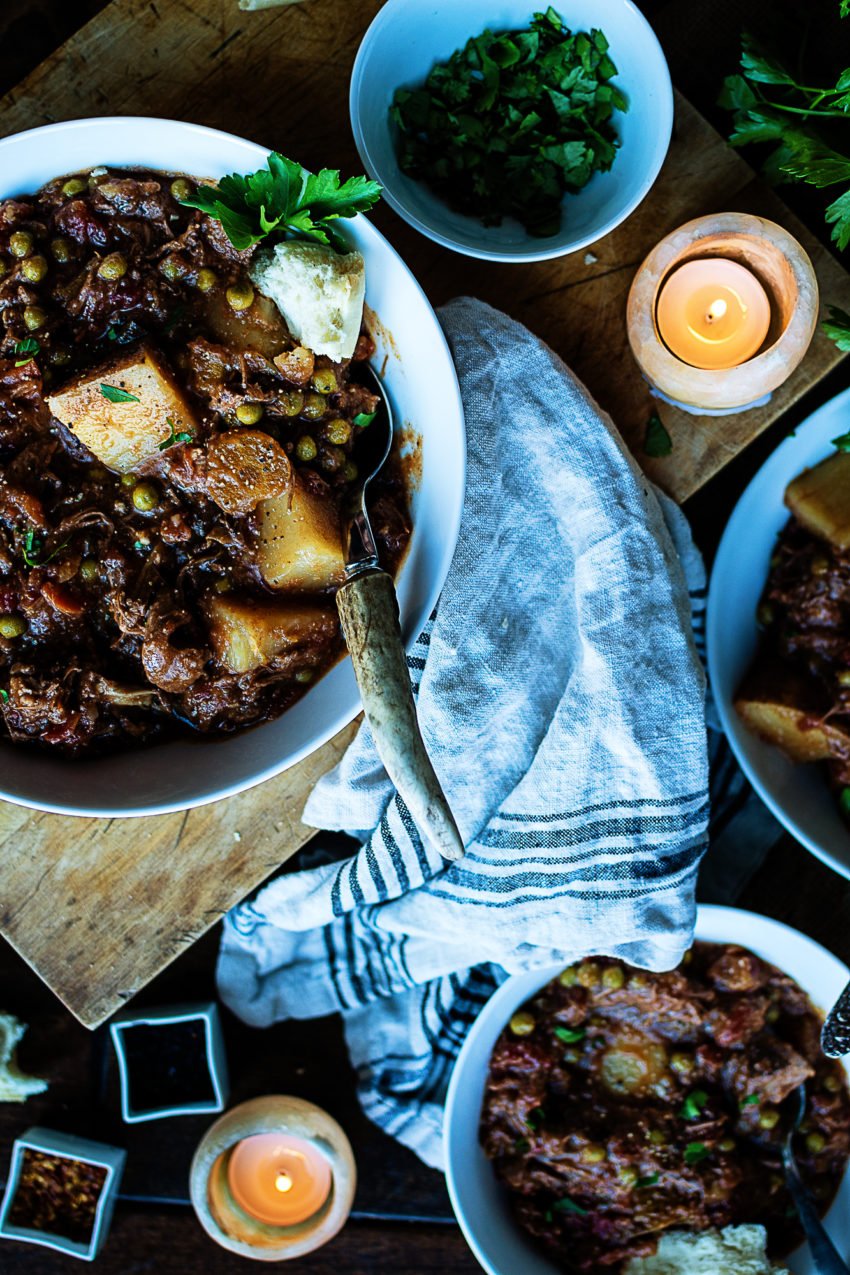 Close up of lamb stew in a serving bowl. 