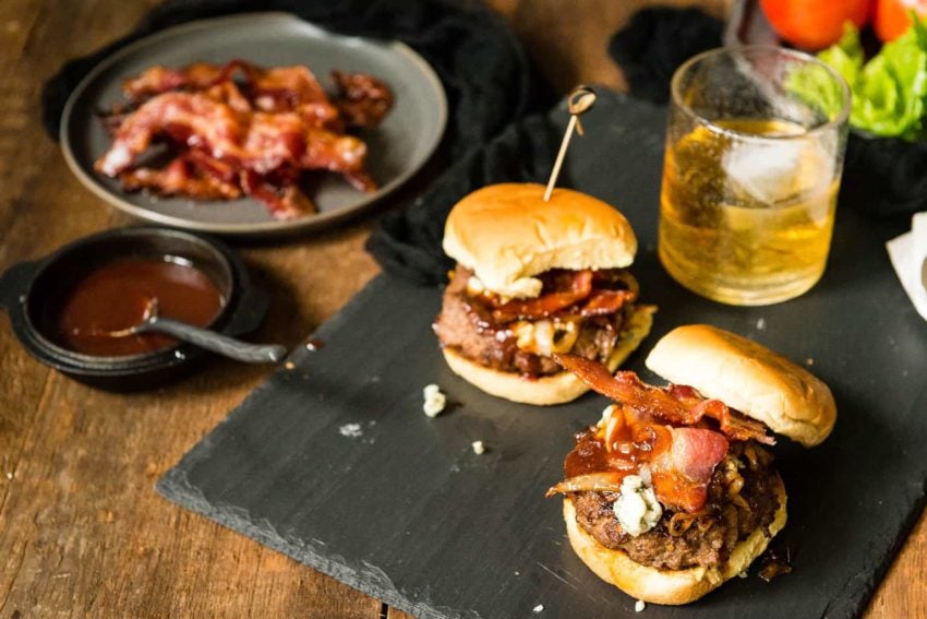 Bourbon and Blue cheese Burgers piled with bacon. And a cocktail, cause duh, cocktails.