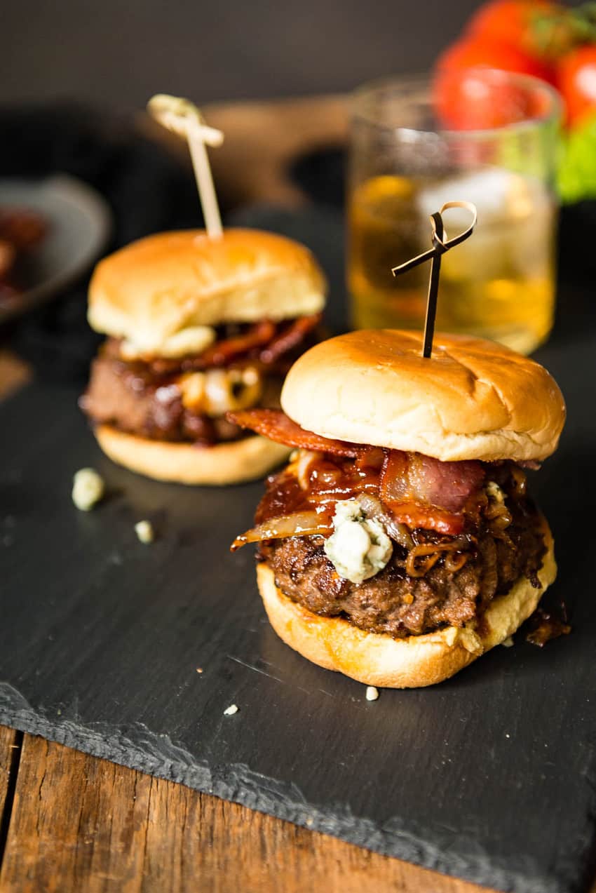 Bourbon and Blue cheese Burgers piled with bacon. Just look at that cheese!