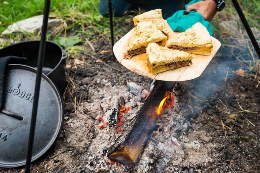 Infuse global flavor into your next pizza with this campfire Berber pizza, Aka, Moroccan Lamb Pizza. A fun stuffed bread baked over a classic campfire.