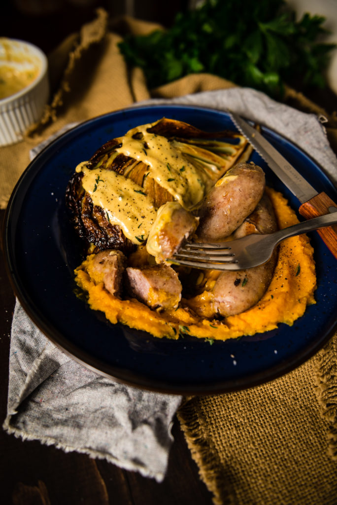 sausage with roasted cabbage and butternut squash puree