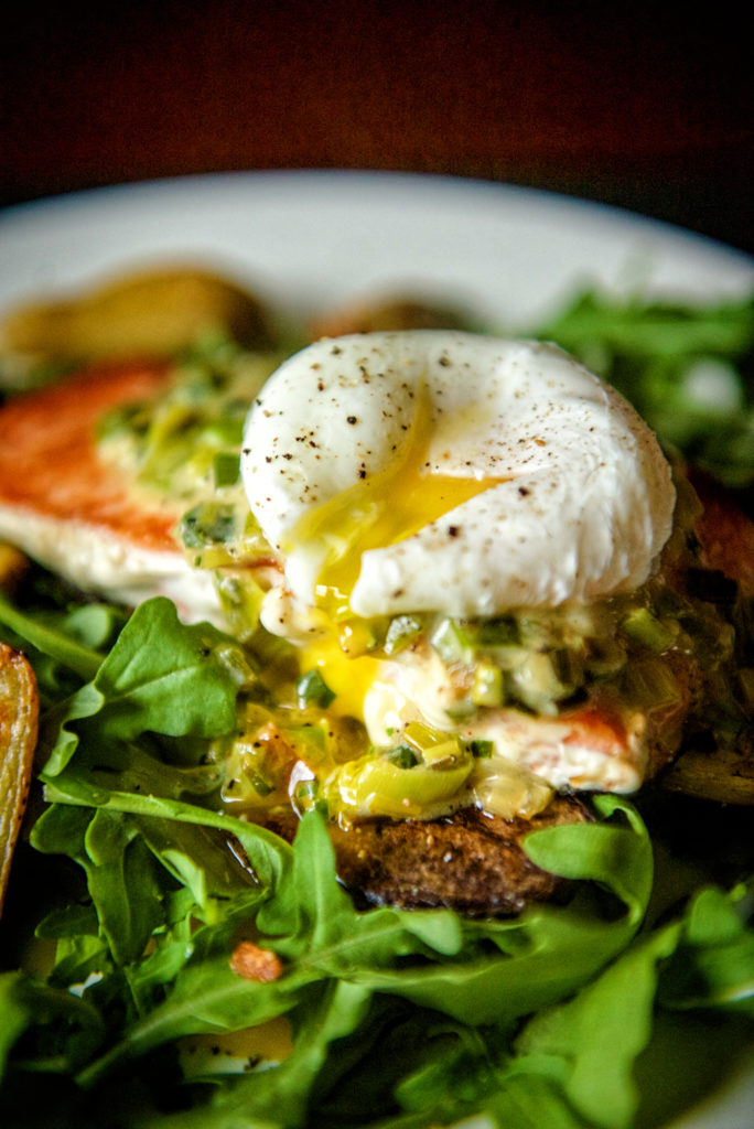 Whole 30 approved pan seared salmon with creamy leeks and poached egg