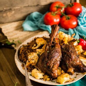Braised Moroccan lamb shanks with harissa and other African flavors is the perfect fork tender recipe; just like what I enjoyed while traveling through Morocco.