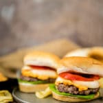 Homemade pimento cheese atop a grilled pork patty recipe is a fun and simple burger every single time!