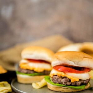 Homemade pimento cheese atop a grilled pork patty recipe is a fun and simple burger every single time!