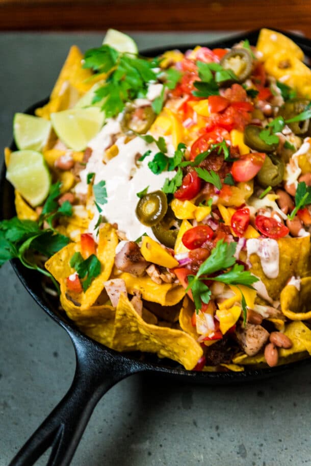 Leftover Smoked Chicken Nachos with Mango Salsa - Girl Carnivore