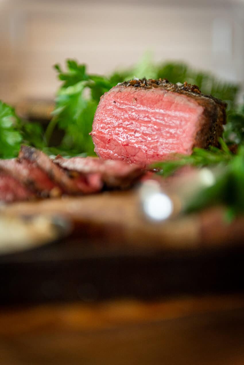 Close up of red medium center to the smoked roast beef.