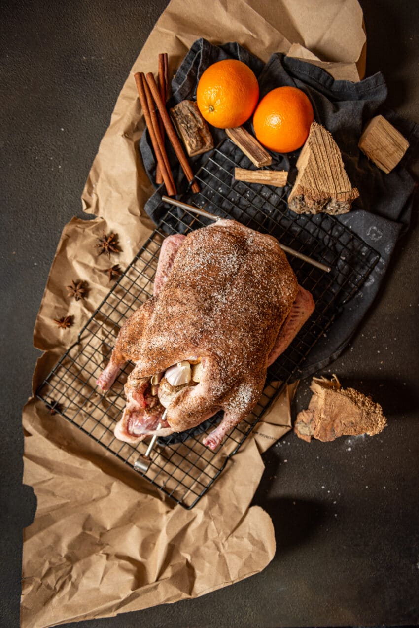 duck rubbed with spice mix and stuffed with garlic and onion