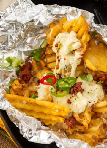 perfect cheese pull on jalapeno popper waffle fries