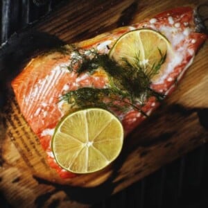 Salmon getting ready to be grilled with lime and salt rub