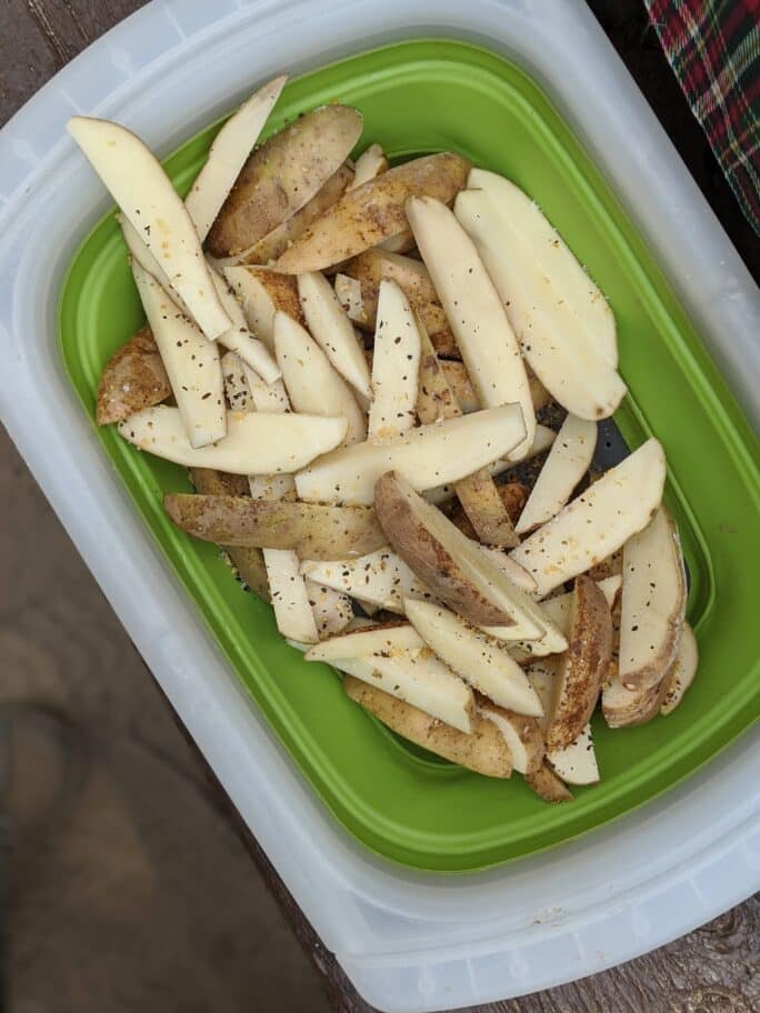 potatoes sliced and tossed in salt and seasoning