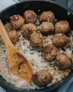 Cast iron pan with meatballs