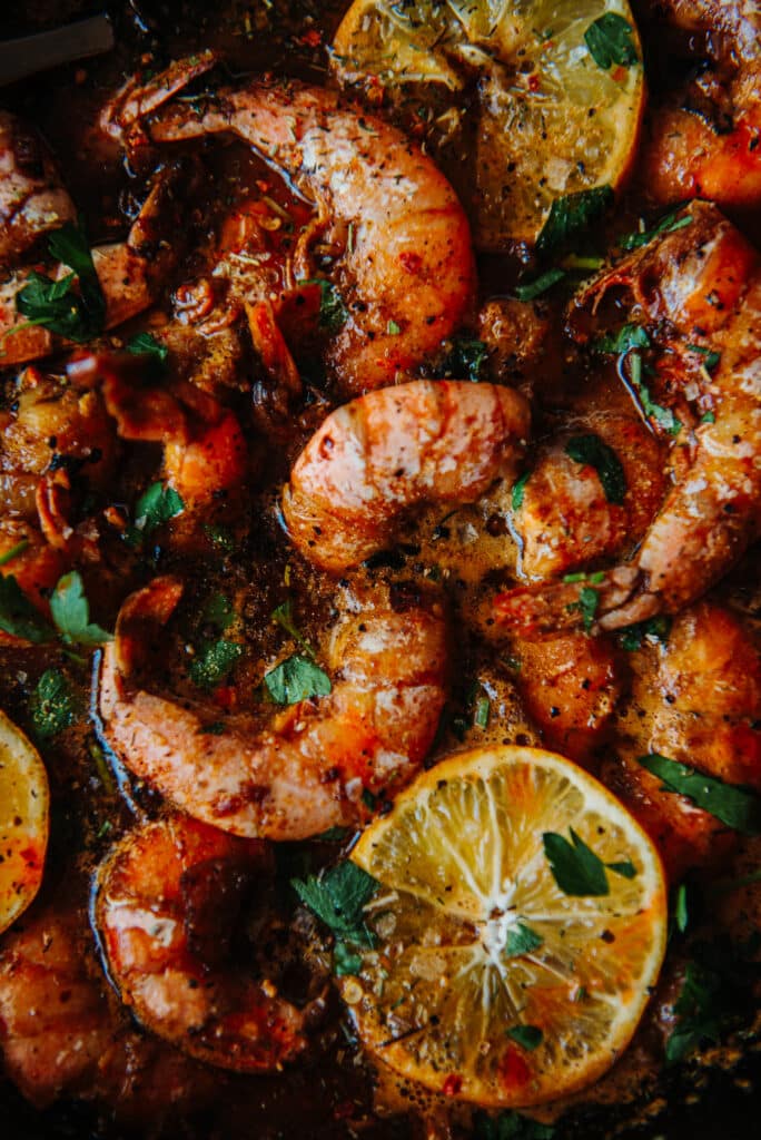 https://girlcarnivore.com/wp-content/uploads/2021/04/Cast-Iron-New-Orleans-BBQ-Shrimp-0010-684x1024.jpg