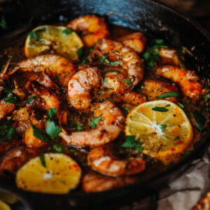 shell on jumbo shrimp in skillet for Cast Iron New Orleans BBQ Shrimp