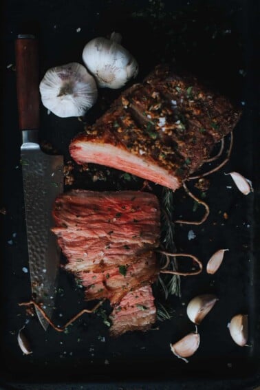 garlic, herbs, and medium rare sliced beef