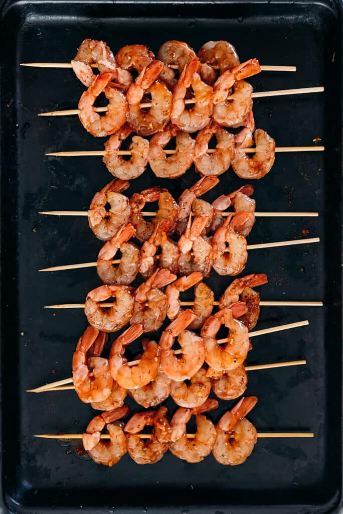 BBQ Shrimp Skewers finished with a fresh chimichurri sauce