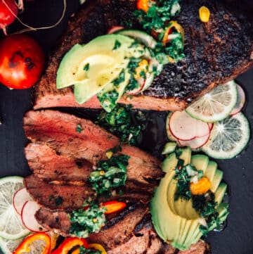 sliced tri tip with avocado, chimichurri and peppers