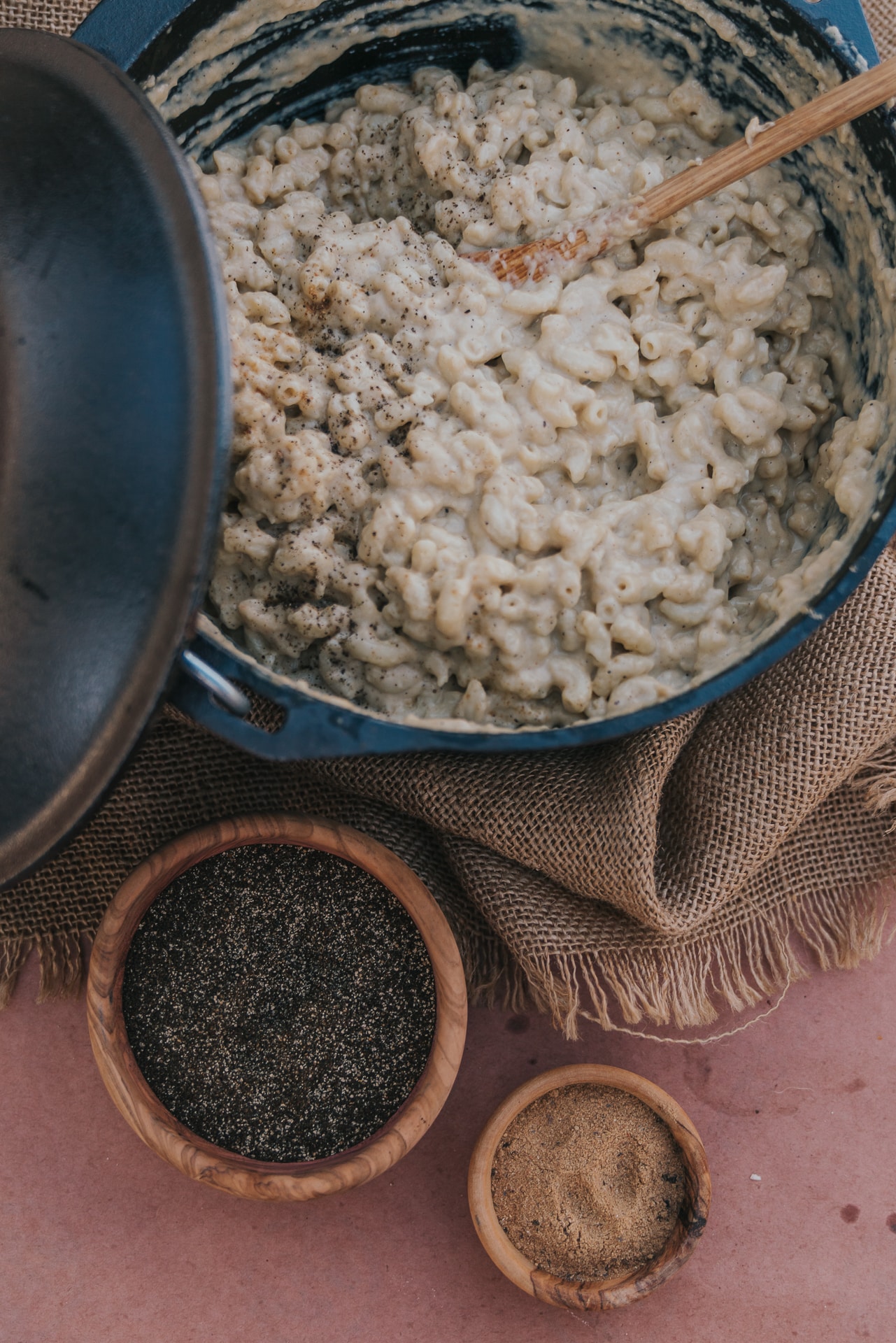 Above shot of Dutch oven with creamy mac n cheese in it. 