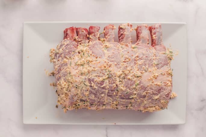 rack of pork rubbed with herb dijon paste