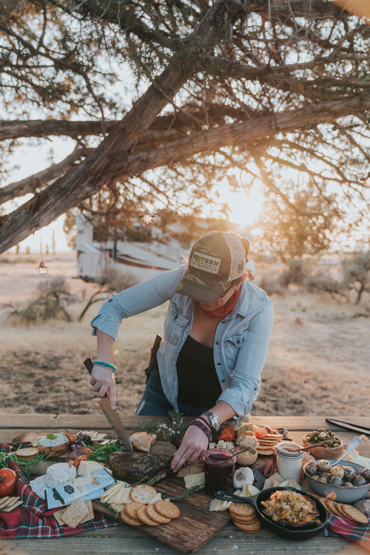 Woman slicing a steak. 