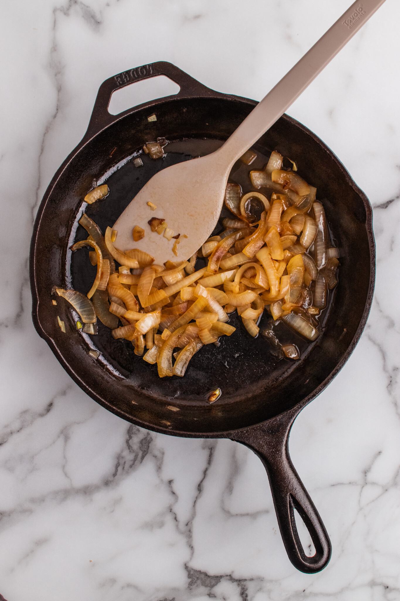 Caramalized onions in a cast iron skillet. 