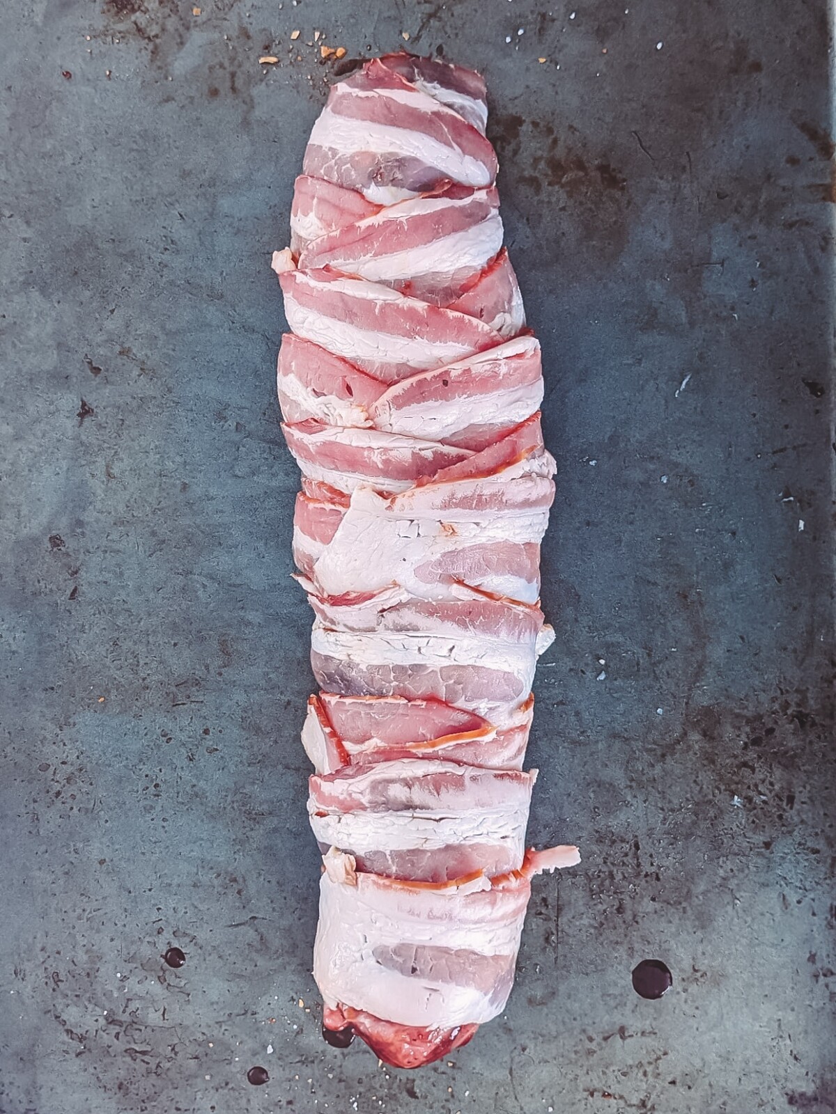 Entire tenderloin wrapped in bacon.